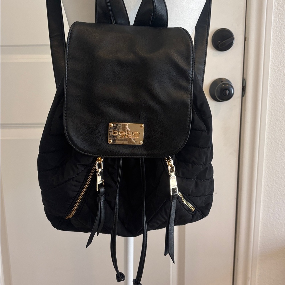 BEBE Black Quilted Backpack with Gold Details